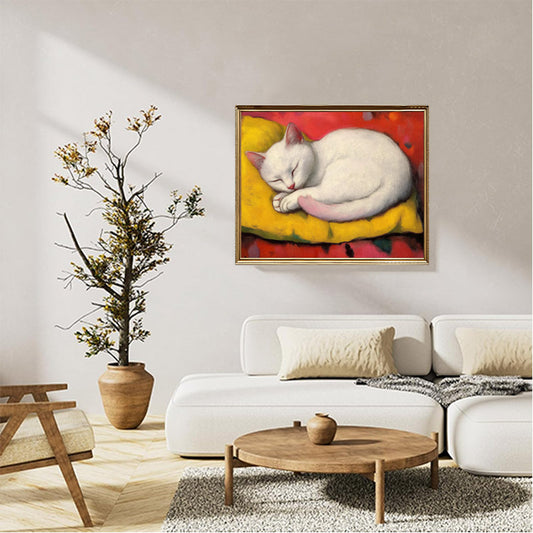 A white cat sleeping